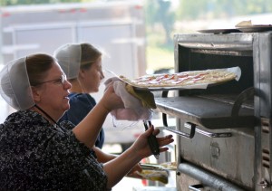 Lots of food, including pizza, was available at the benefit auction for the Clinic for Special Children Saturday.